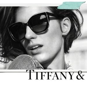 A woman wearing Tiffany and co glasses