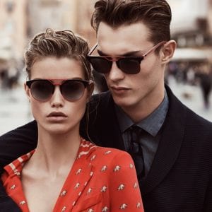 Couple wearing Emporio Armani Glasses